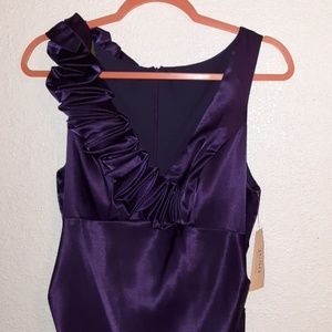 Elegant deep purple silky dress.